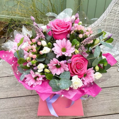 Pretty Pink Gift box - A beautiful selection of Roses, chrysanthemums, Veronica , Hypericum and Spray Carnations.  Arranged so they can be placed on a table ready to be admired.